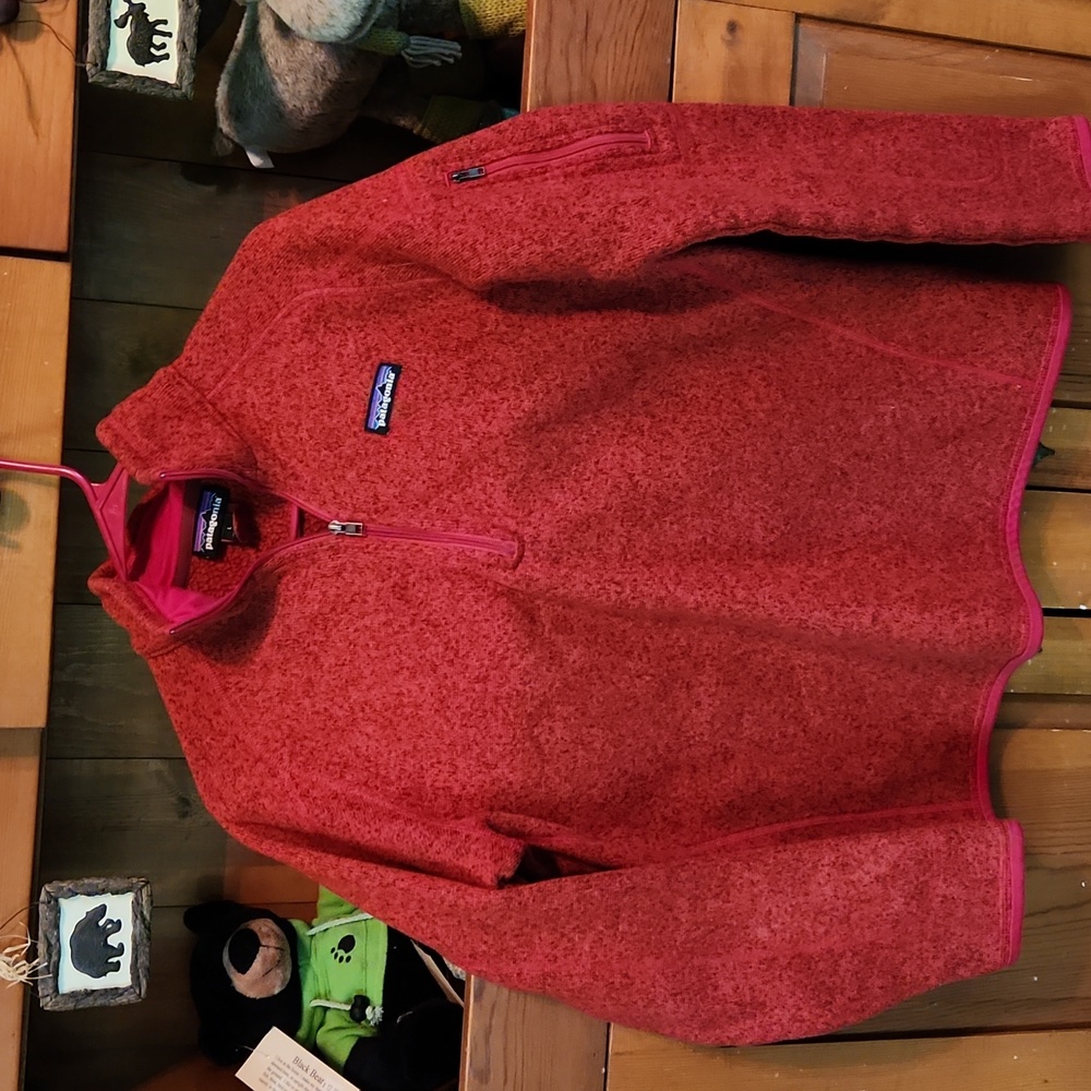 Patagonia ladies size Large, red pull over, fleece lined.